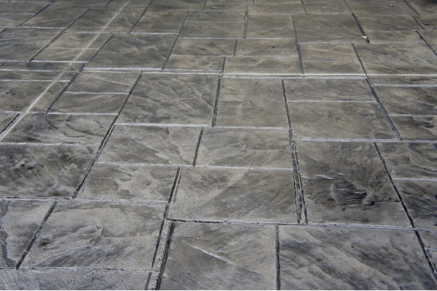 Stenciled Concrete Apply intricate designs, logos, borders, or geometric patterns using stencils with colored concrete or stains.