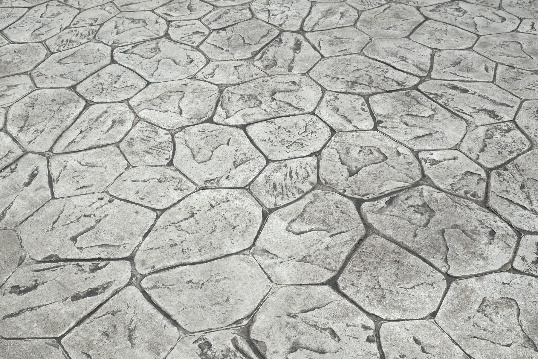 Scored/Cut Patterns Create custom designs by cutting or tooling patterns into fresh or cured concrete for sophisticated, clean-lined aesthetics.